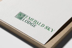 Emerald Sky Lodge logo.
